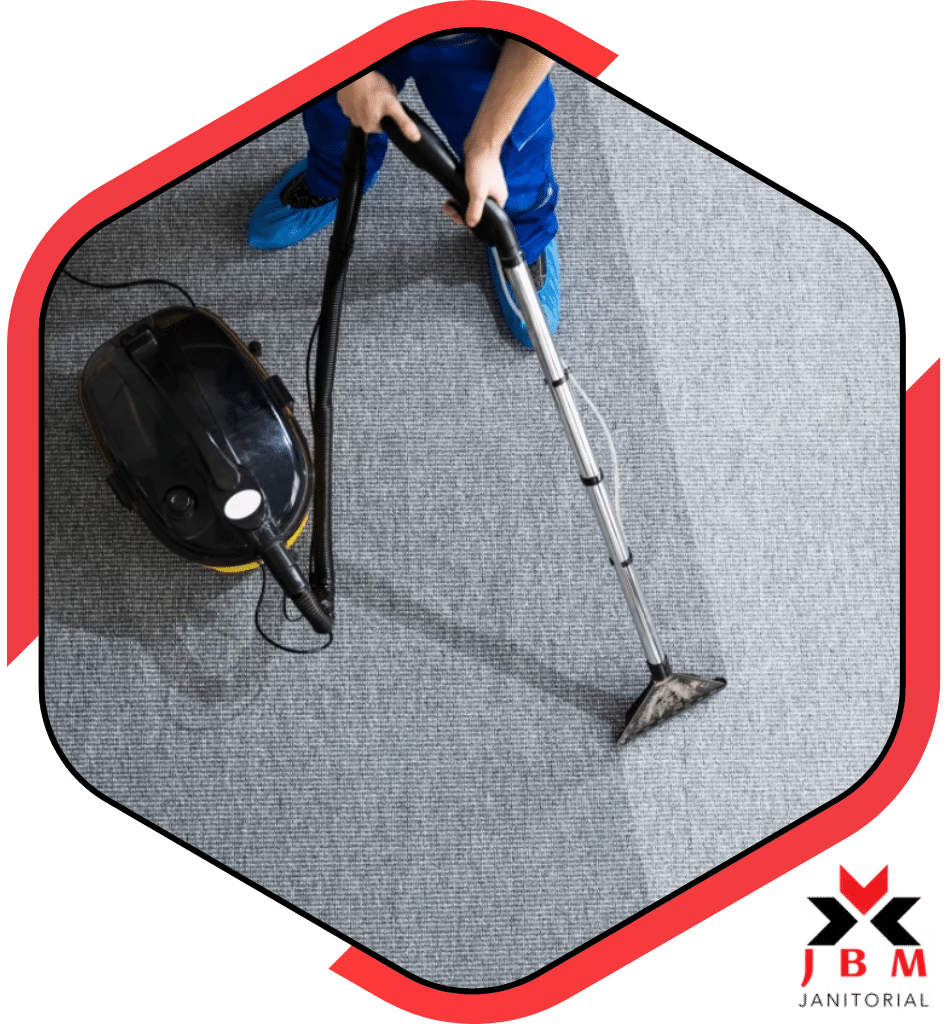 Professional carpet cleaning services using a commercial vacuum cleaner to deep clean office carpets, ensuring a fresh and spotless environment for businesses.